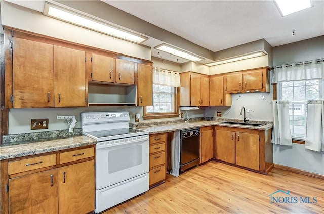 kitchen featuring dishwasher, white electric stove, plenty of natural light, and sink