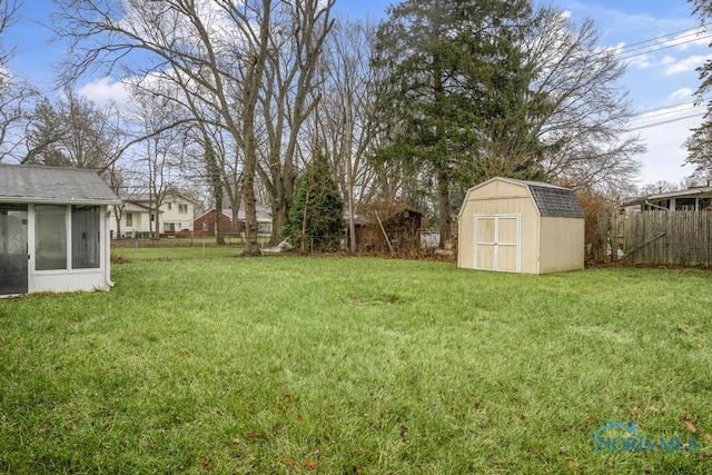 view of yard featuring a sunroom