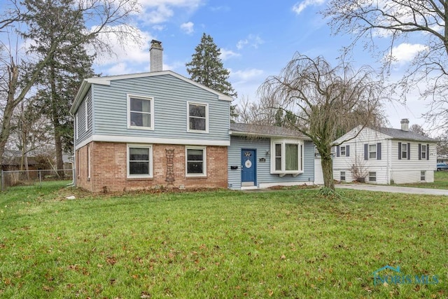 view of front of home with a front yard