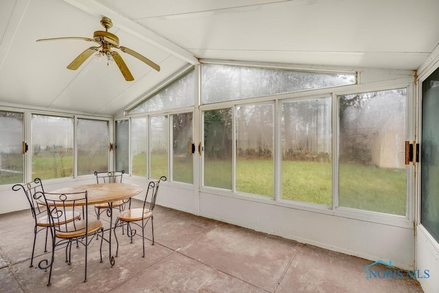 sunroom with vaulted ceiling with beams and ceiling fan