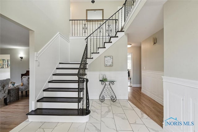 stairway featuring hardwood / wood-style flooring