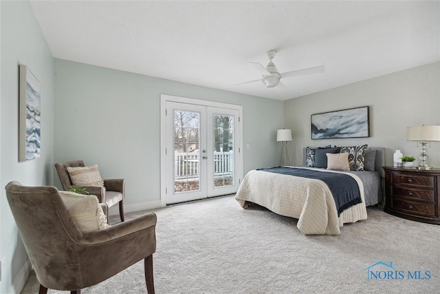 carpeted bedroom with access to outside, ceiling fan, and french doors