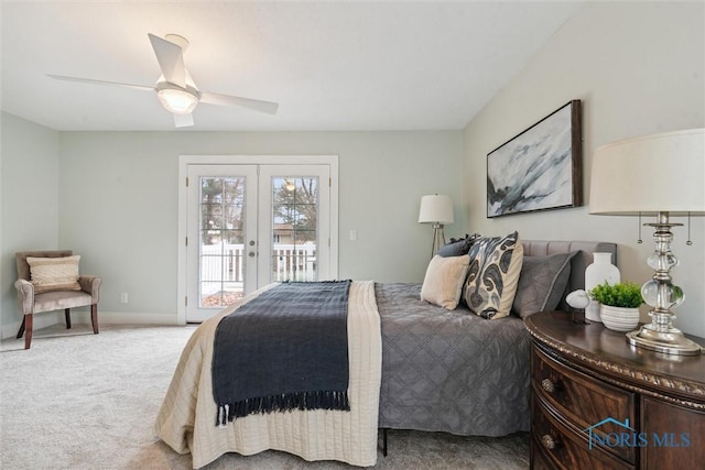 carpeted bedroom featuring ceiling fan, access to exterior, and french doors