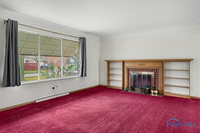 unfurnished living room with carpet flooring, crown molding, a fireplace, and a baseboard radiator