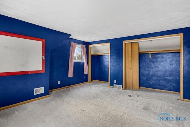 unfurnished bedroom featuring carpet floors