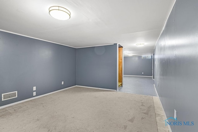 unfurnished room with light colored carpet