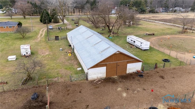 birds eye view of property featuring a rural view