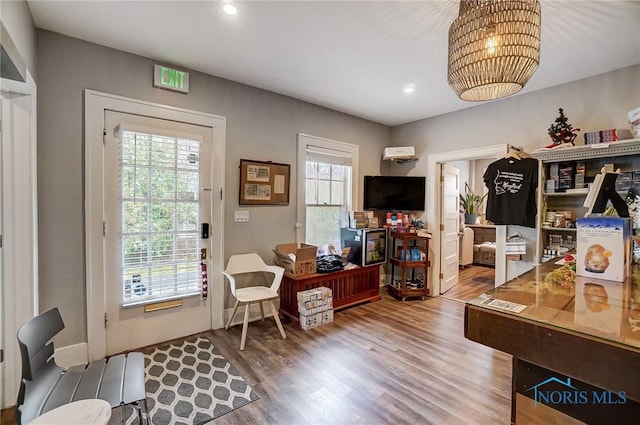 office space with hardwood / wood-style flooring and a wealth of natural light