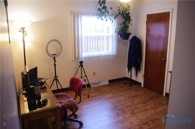 office featuring hardwood / wood-style floors