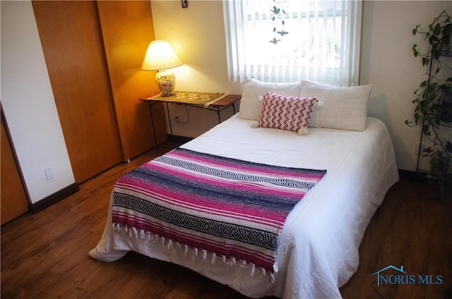 bedroom featuring hardwood / wood-style floors