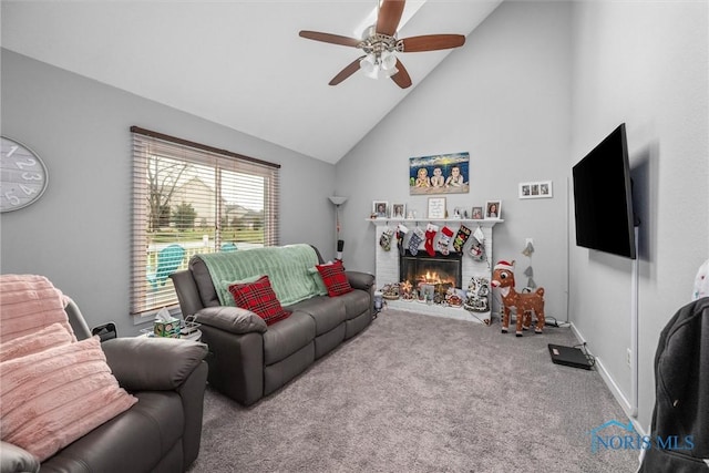 living room featuring carpet flooring, high vaulted ceiling, and ceiling fan