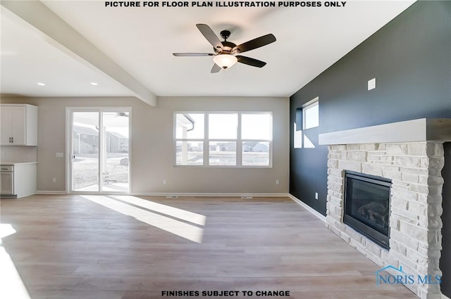 unfurnished living room with a fireplace, ceiling fan, plenty of natural light, and beamed ceiling