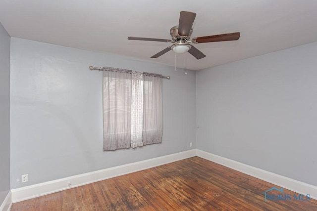 unfurnished room with hardwood / wood-style flooring and ceiling fan