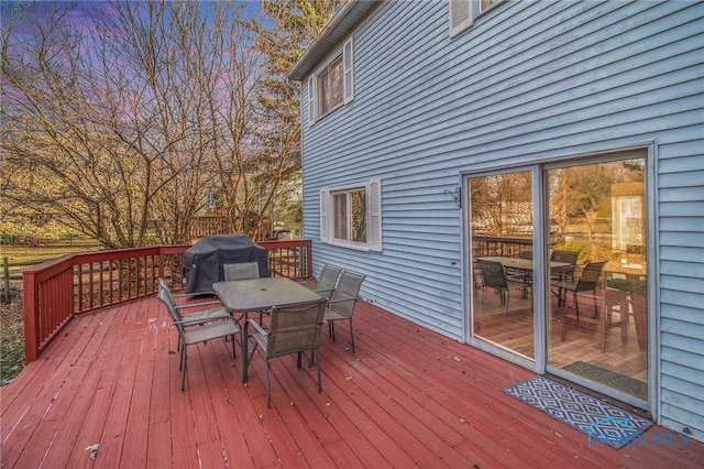 wooden terrace with grilling area