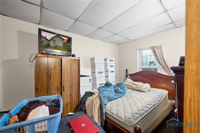 bedroom with a drop ceiling