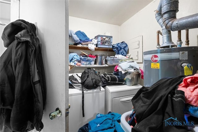 washroom featuring separate washer and dryer and water heater