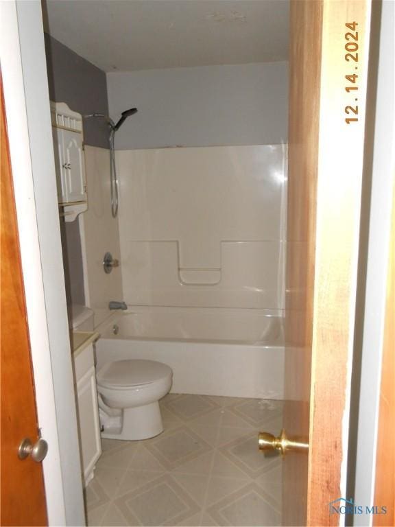 full bathroom with vanity, toilet, and shower / washtub combination