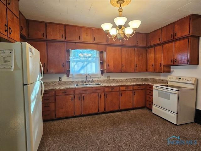 kitchen with pendant lighting, white appliances, dark colored carpet, sink, and a notable chandelier