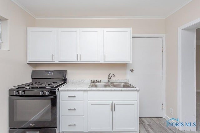 kitchen with white cabinetry, sink, black range with gas stovetop, light hardwood / wood-style floors, and ornamental molding