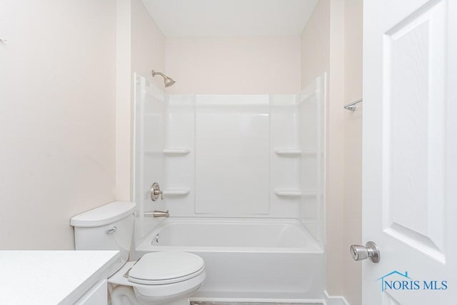 full bathroom with shower / bathing tub combination, vanity, and toilet