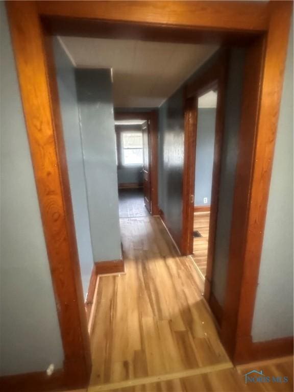 hallway featuring light hardwood / wood-style floors