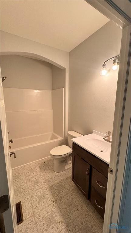 full bathroom with vanity, bathing tub / shower combination, and toilet