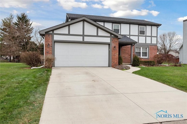 view of front of house featuring a garage and a front lawn