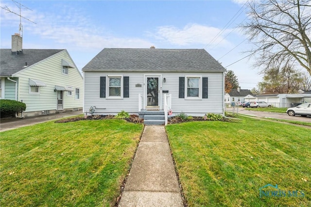 bungalow with a front yard