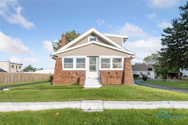 view of front of house with a front yard