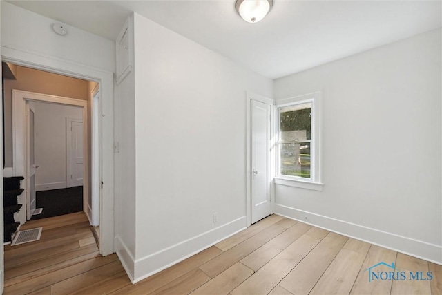 empty room featuring light hardwood / wood-style floors