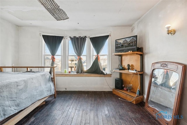 unfurnished bedroom featuring dark hardwood / wood-style floors