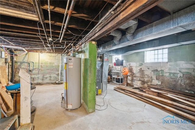 basement featuring heating unit and gas water heater