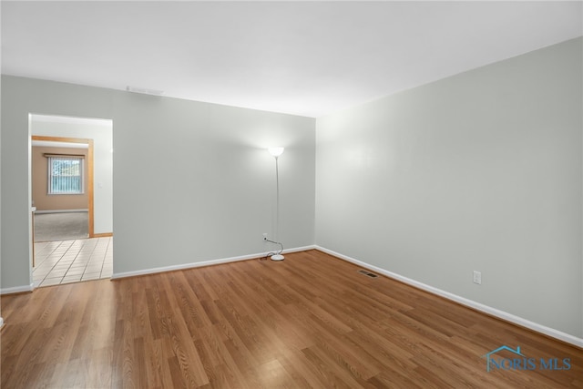 empty room featuring light hardwood / wood-style floors