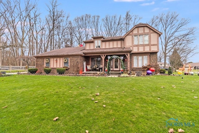 view of front of property with a front lawn