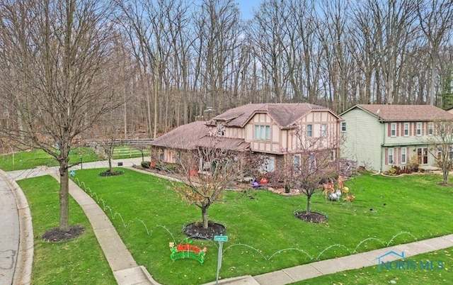 view of front of home with a front yard