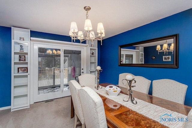 dining area with a chandelier