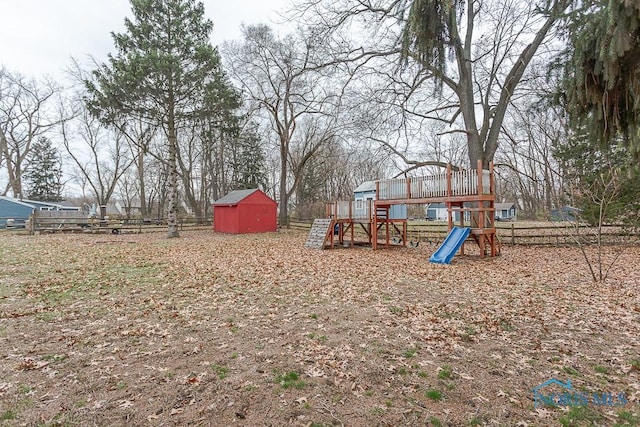 view of play area with a storage unit