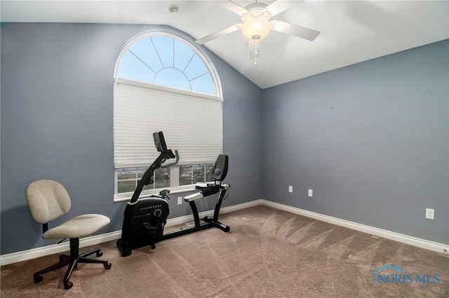 workout room with ceiling fan, carpet floors, and vaulted ceiling