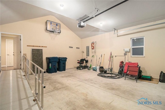 garage featuring electric panel and a garage door opener