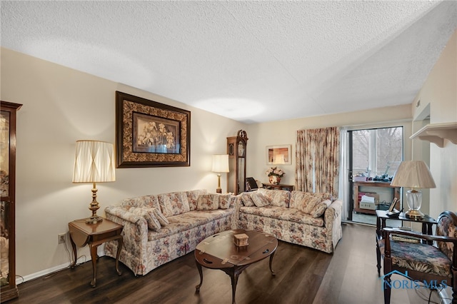 living room featuring a textured ceiling and dark wood-type flooring