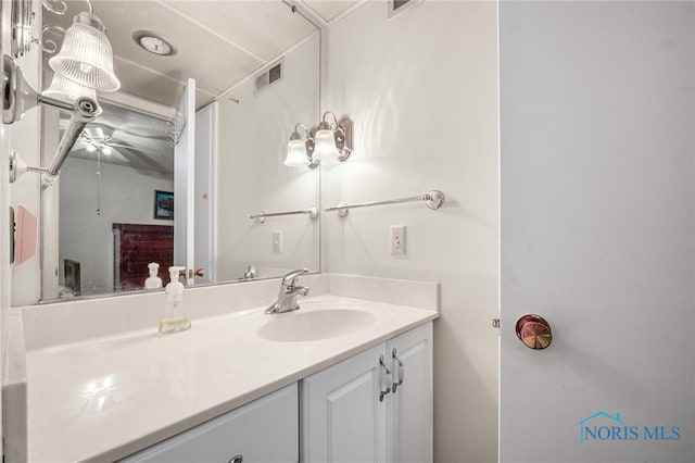 bathroom with vanity and ceiling fan