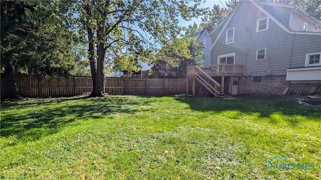 view of yard with a deck