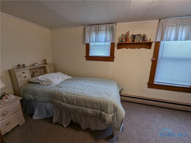 bedroom featuring carpet flooring, a baseboard radiator, and ornamental molding