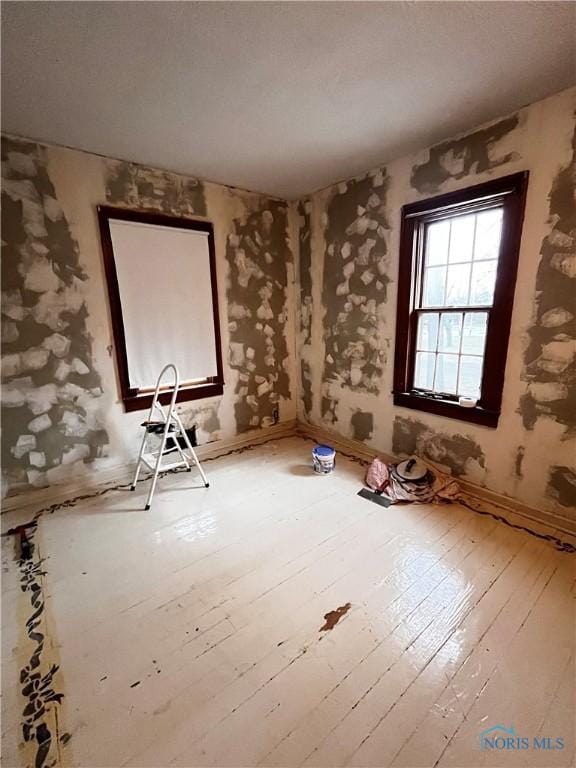 miscellaneous room with light wood-type flooring