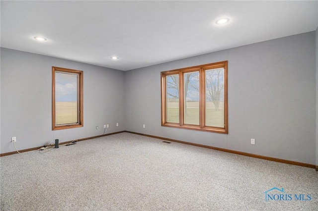 view of carpeted spare room