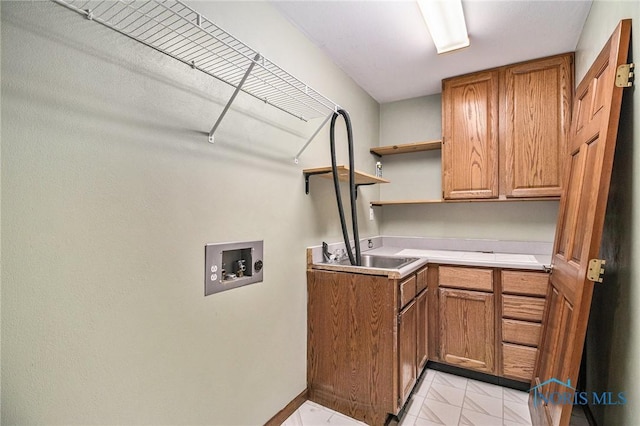 laundry room featuring cabinets and hookup for a washing machine