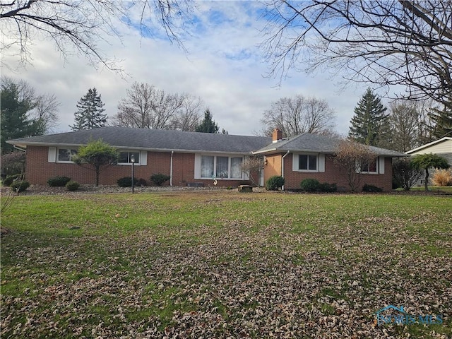 ranch-style house with a front yard