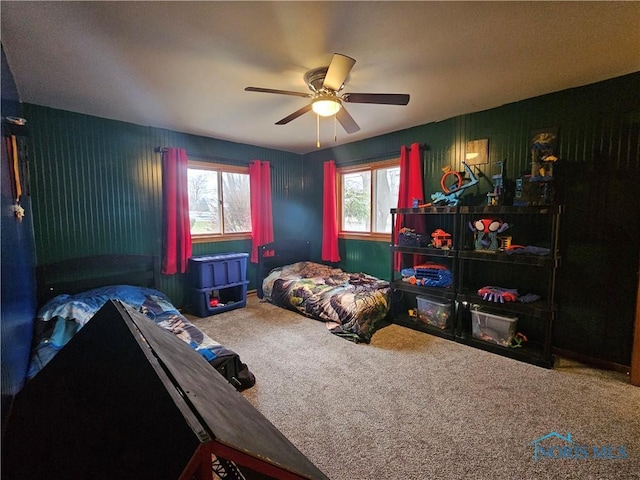 bedroom featuring carpet flooring and ceiling fan