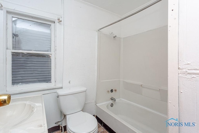 full bathroom with vanity, shower / bathing tub combination, ornamental molding, and toilet