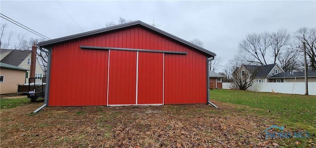 view of outdoor structure featuring a yard